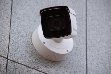 Surveillance camera in the area, street security, face recognition. Security system