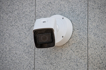 Surveillance camera in the area, street security, face recognition. Security system
