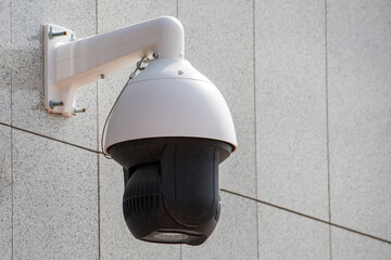 Surveillance camera in the area, street security, face recognition. Security system