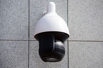 Surveillance camera in the area, street security, face recognition. Security system