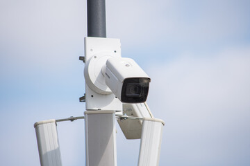 Surveillance camera in the area, street security, face recognition. Security system