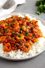 Homemade Cuban Shrimp Creole on a Plate on a gray surface, side view.