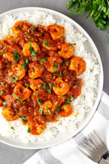 Homemade Cuban Shrimp Creole on a Plate on a gray surface, top view. Flat lay, overhead, from above.