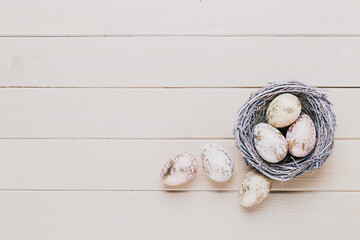 Spring easter tulips in bucket on white vintage background.