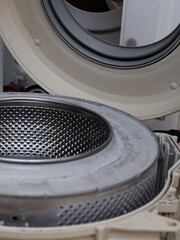 Front load washing machine repair. Disassembled washing drum