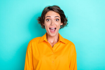 Closeup photo of young crazy funny attractive lady open mouth speechless amazed look you unexpected deal information shopping isolated on cyan color background