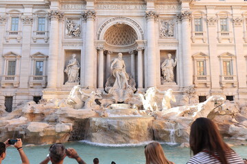 Trevi Fountain View with Tourists Taking Pictures in Rome, Italy