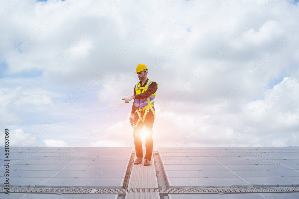 Poster technicians are checking solar panel,engineer service check installation solar cell on the roof of f