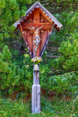 Typical mountain crucifix in South Tyrol. Italy