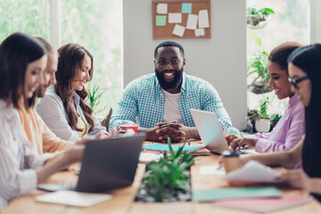 Photo of cheerful busy businessman businesswoman working start up together indoors workplace...