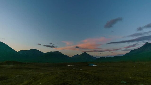 Time lapse of sunrise over the mountains of Cuillins on Skye, Scotland, United Kingdom