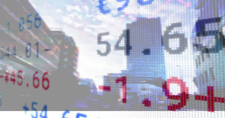 Image of statistics and financial data processing over cityscape