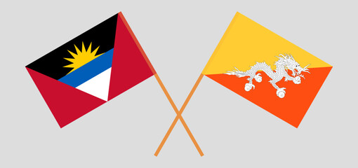Crossed flags of Bhutan and Antigua and Barbuda. Official colors. Correct proportion
