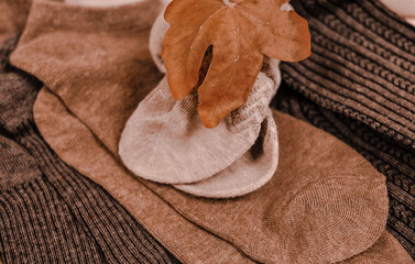 Close up of brown cotton socks autumn cozy clothing