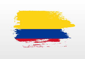 Modern style brush painted splash flag of Colombia with solid background