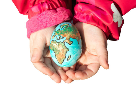 Child holding a Planet Earth Easter Egg