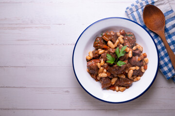 Stewed beef with broad beans and carrot. Traditional northern Spanish tapas.