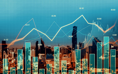 Financial graphs and digital indicators overlap with modernistic urban area, skyscrabber for stock market business concept. Double exposure.