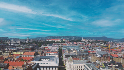 Aerial View Of Cityscape Against Sky with clouds