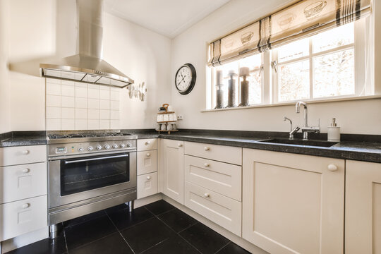 Modern Kitchen With White Cabinets