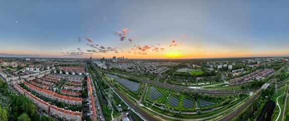 Aerial panorama with view of the skyline in The Hague, Netherlands, at sunset above the town of...