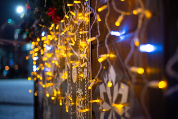 luminous garlands in the evening on the street