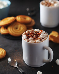 A mug with hot chocolate with marshmallow	