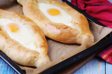 Two Georgian Khachapuri with eggs
