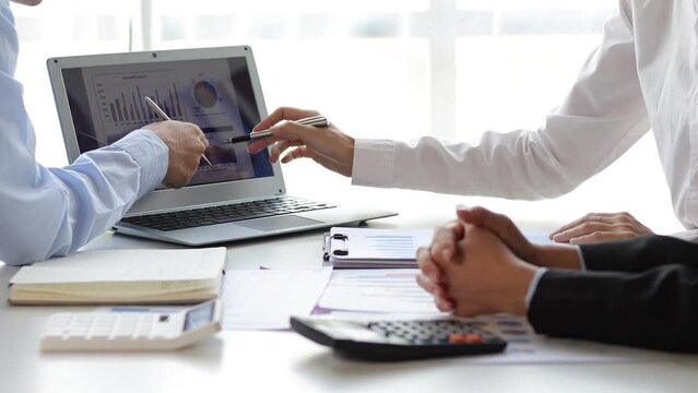 Business colleagues analyzing financial documents at office business people teamwork and brainstorming planning financial report analysis business plan investment accounting analysis concept