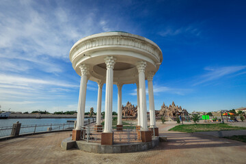 View to the Public Amusement Park with Ferris Wheel and White Rotunda in Urgench, Uzbekistan