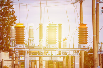 High voltage power transformer substation.High voltage electric power transformers in the blue...
