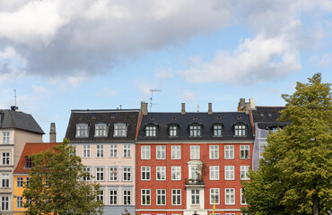 Colorful facade of traditional old houses in Copenhagen.