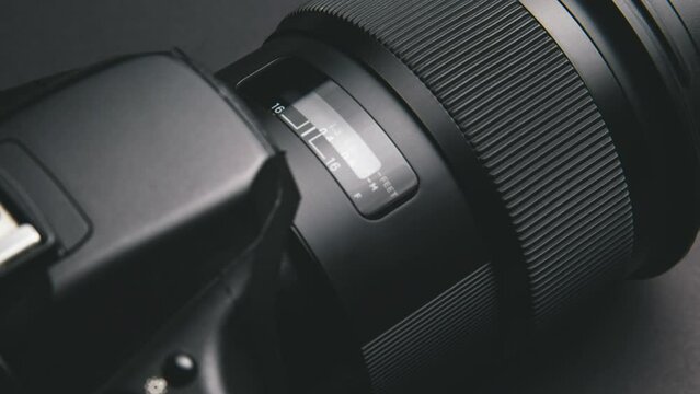 close up of DSLR body and lens - photography equipment - zoom in shot