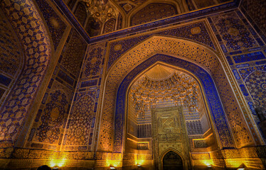 Fototapeta na wymiar Oriental Decorated Colorful Details of Madrasa on the Registan Square in Samarkand, Uzbekistan