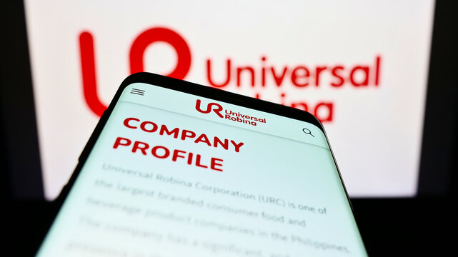 Stuttgart, Germany - 09-10-2022: Smartphone with website of company Universal Robina Corporation (URC) on screen in front of business logo. Focus on top-left of phone display.