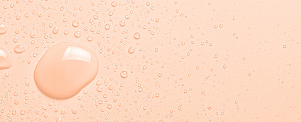 Drops of cosmetic product for moisturizing or removing makeup. Micellar water. Macrophotography