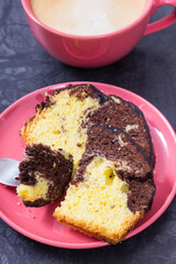 Fresh baked yeast dough with cocoa for different festive occasions, coffee with milk. Delicious dessert