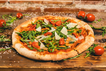 Homemade pizza with vegetables and cheese