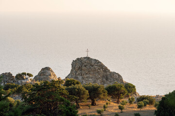 Orthodox cross on a rock