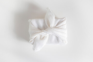 Obraz premium Furoshiki is a Japanese wrapping fabric traditionally used in Asia for gifts. Ecological gifts.