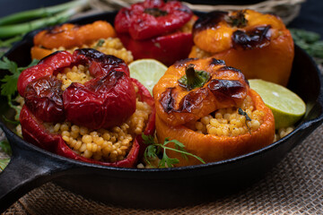 Vegan cous cous stuffed bell peppers