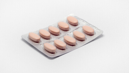 close-up pack of pills isolated on white background