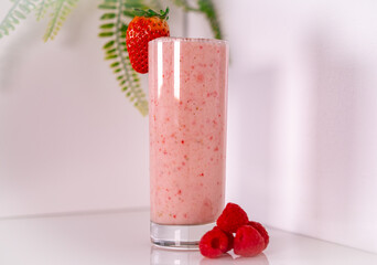 strawberry smoothie with strawberry and raspberries