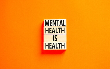 Mental health psychological symbol. Concept words Mental health is health on wooden blocks on a...