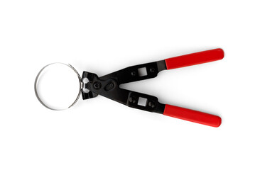 Red pliers for steel belt clamps isolated on white background.