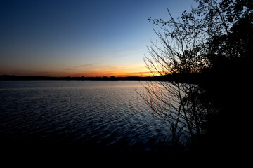 sunset on the lake in autumn