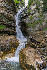 Naklejka na ściany i meble Hike to the Keilkeller waterfall near Mayrhofen in the Zillertal Alps