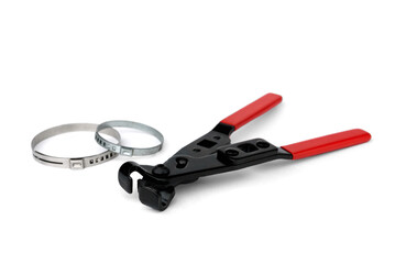 Red pliers for steel belt clamps isolated on white background.