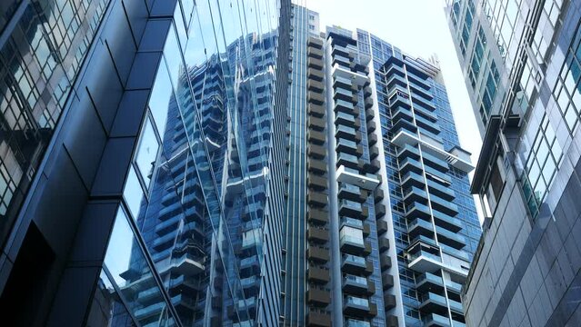 low angle view of singapore city buildings.