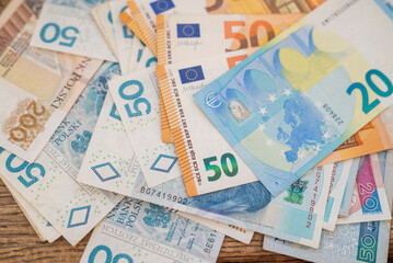 bills money cash zloty polish and euro for payment